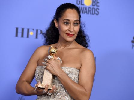 Tracee Ellis Ross poses in the press room with the award for best performance by an actress in a television series - musical or comedy for "Black-ish" at the 74th annual Golden Globe Awards at the Beverly Hilton Hotel on Sunday, Jan. 8, 2017, in Beverly Hills, Calif. (Photo by Jordan Strauss/Invision/AP)