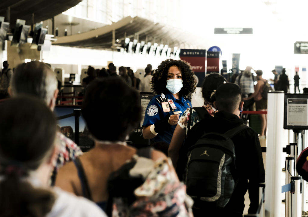 Travelers At Detroit Metro Airport As TSA Experiences Staff Shortages