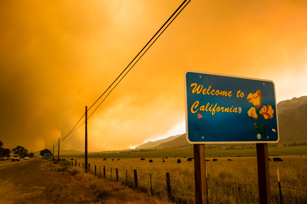 A sign welcoming people to California seen in front of the...