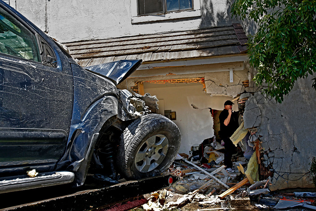 PALMDALE, CA. - APRIL 20, 2014: The SUV is removed from the apartment where a 16 year-old Palmdale g