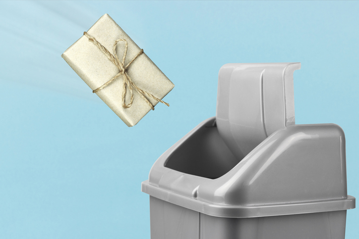 gift is thrown in the trash