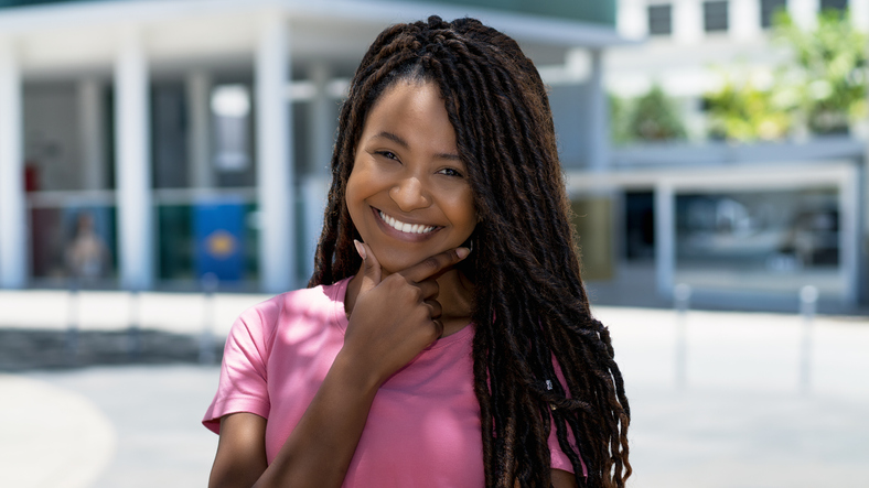 Beautiful laughing black woman with dreadlocks
