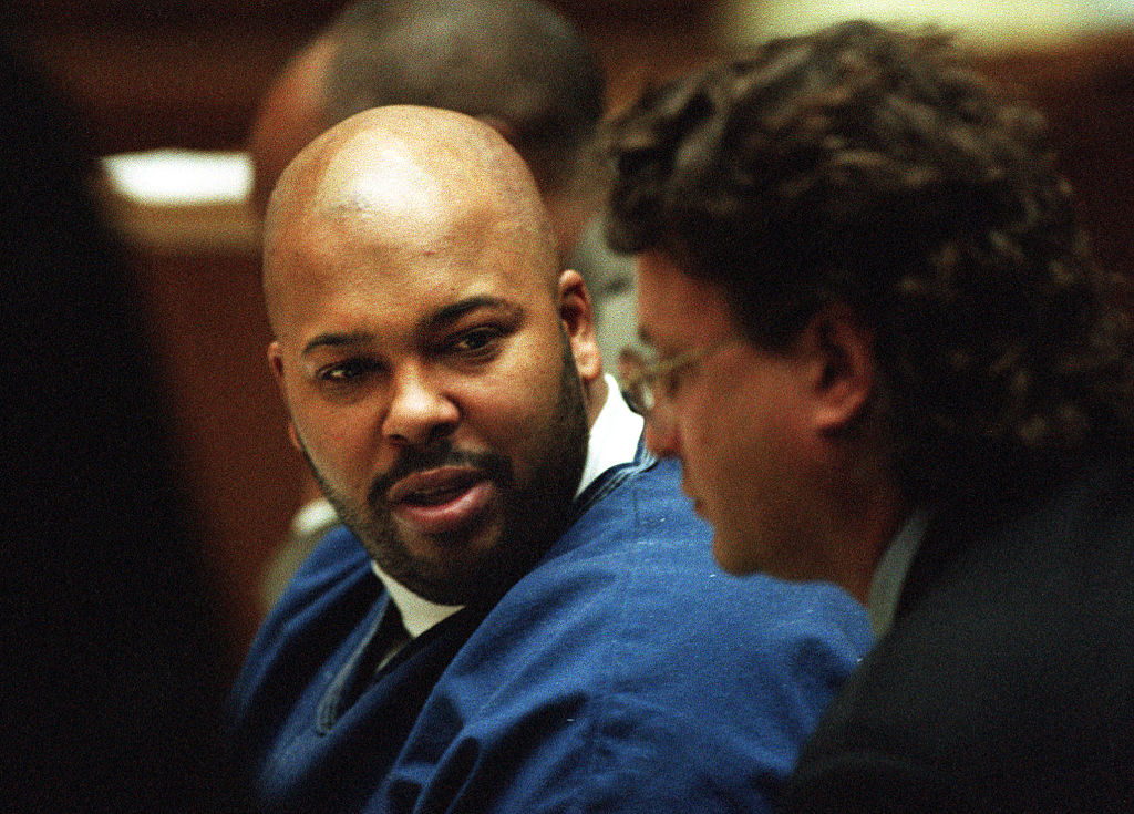 ME.Suge.1.0228.KL Marion "Suge" Knight talks to his attorney, David Z. Chesnoff, right, in Los An