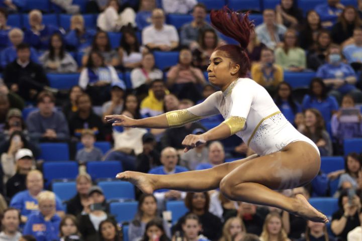 UCLA Gymnast Nya Reed Reps for Delta Sigma Theta and Divine 9 During Performance
