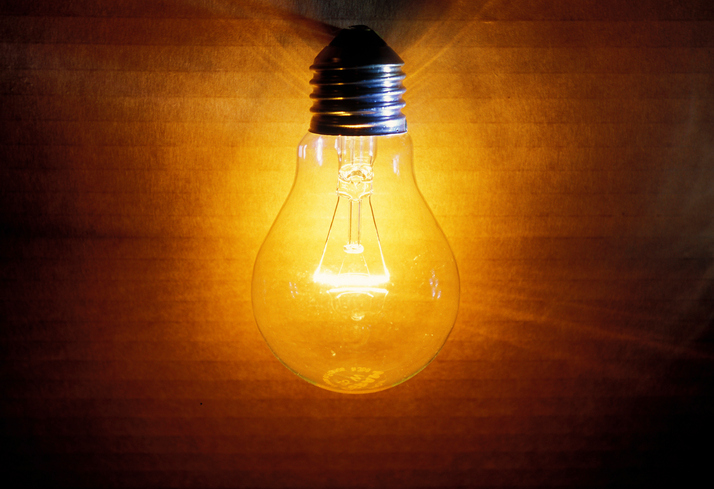 closeup of an old burning light bulb