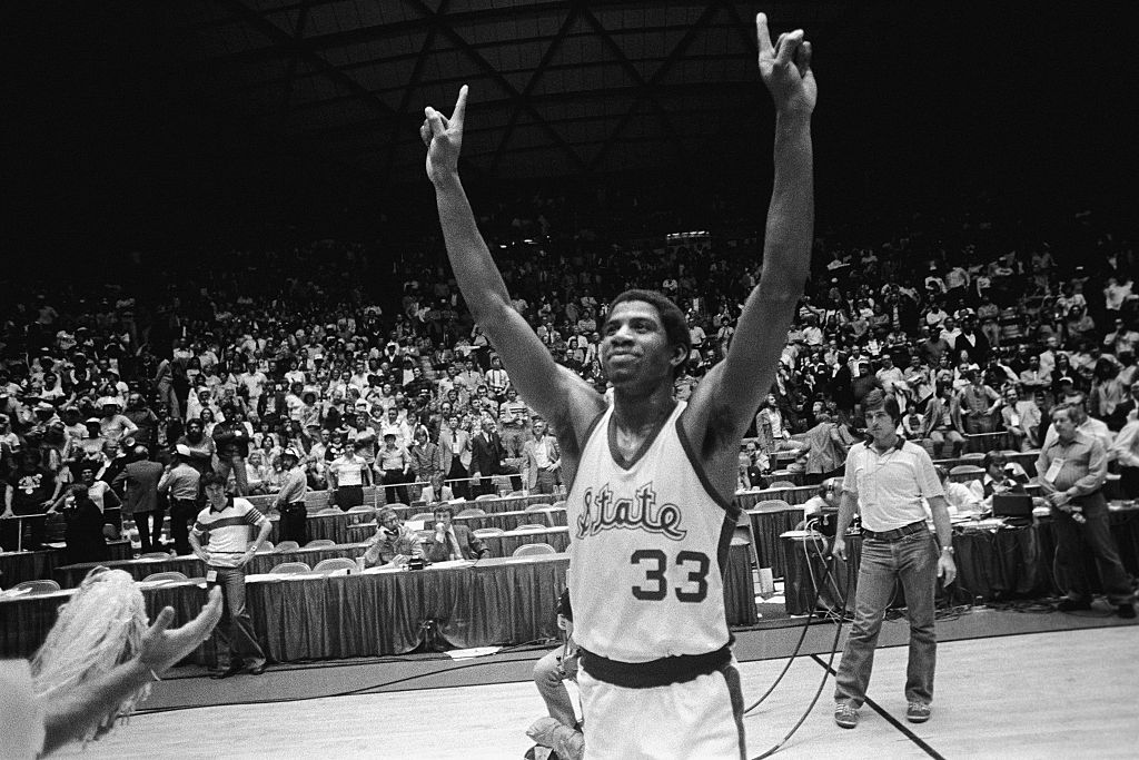 Magic Johnson With Hands Raised in Victory
