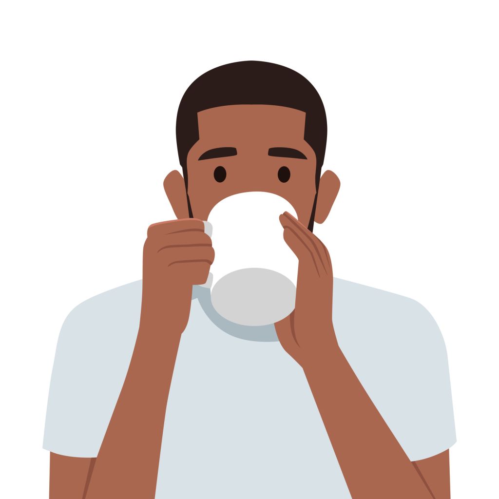 Man enjoying hot tart coffee drink after waking up in morning.