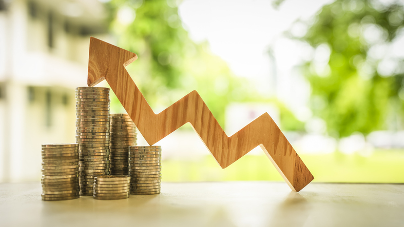 Up Arrow symbol with coins stack. Concepts of the banking system, rising interest rates, inflation, deflation, and savings.